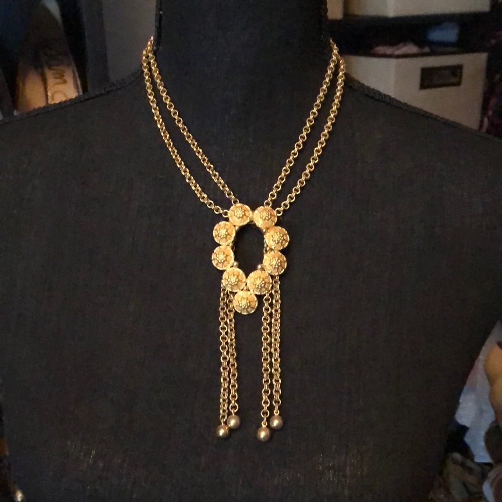 Vintage gold, clasped costume jewelry